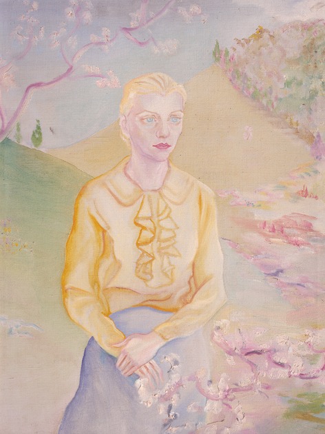Blonde Woman Standing By Flowering Tree